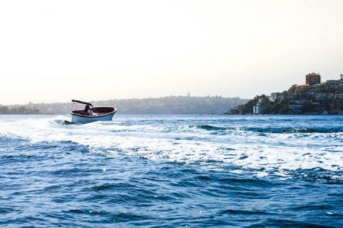 Lekker Boats riding in the water